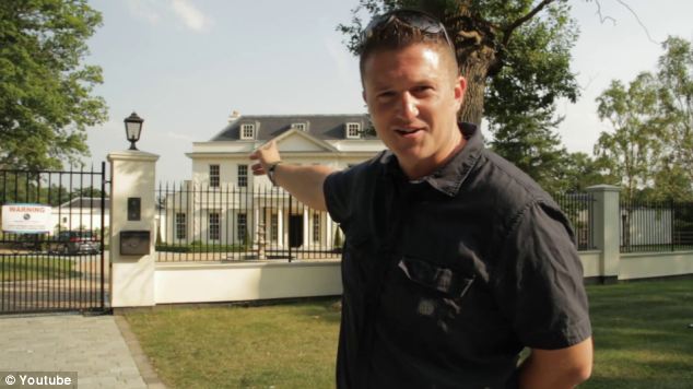 English Defence League leader Tommy Robinson outside Tulisa's home